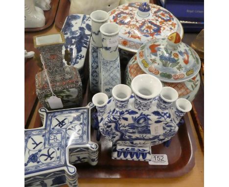 A group of modern Chinese ceramics, comprising two blue and white boxes and covers; a tulip vase; a polychrome baluster vase 