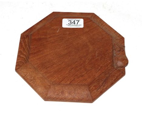 Workshop of Robert 'Mouseman' Thompson, octagonal oak teapot stand, with carved mouse signature 