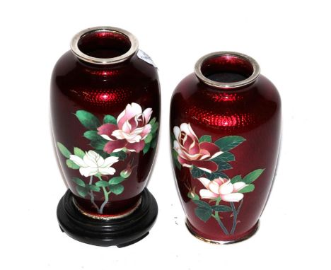 A pair of cloisonne red enamel floral vases with modern stands