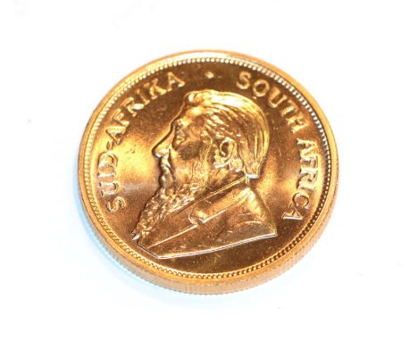 South Africa, 1974 Krugerrand. 1 oz. fine gold (.999). Obv: Bust of Paul Kruger left. Rev: Springbok, 19 - 74 either side. KM