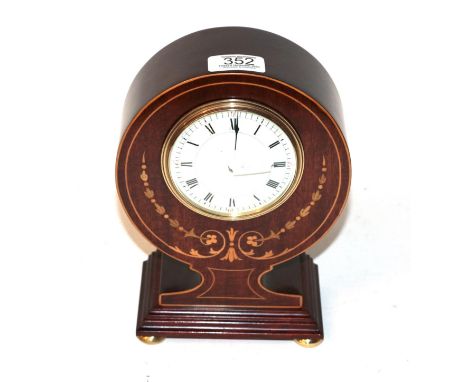 An Edwardian mahogany and marquetry inlaid mantel clock 