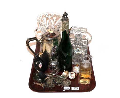 A group of assorted items including a Scottish silver kings pattern sauce ladle, an American silver ladle, a silver plated ch