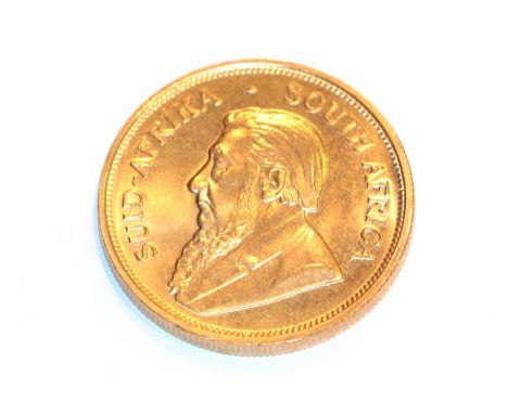 South Africa, 1974 Krugerrand. 1 oz. fine gold (.999). Obv: Bust of Paul Kruger left. Rev: Springbok, 19 - 74 either side. KM