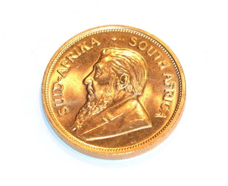 South Africa, 1974 Krugerrand. 1 oz. fine gold (.999). Obv: Bust of Paul Kruger left. Rev: Springbok, 19 - 74 either side. KM