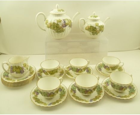 A ROYAL WORCESTER BONE CHINA PART TEA SERVICE "Vine Harvest" pattern, comprising teapot, bachelor teapot, milk jug, six cups,