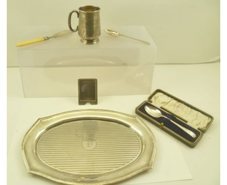 A SILVER SERVING TRAY having shaped edge and engine turned lines to sole, central engraved "D" monogram, Birmingham 1922, 29c