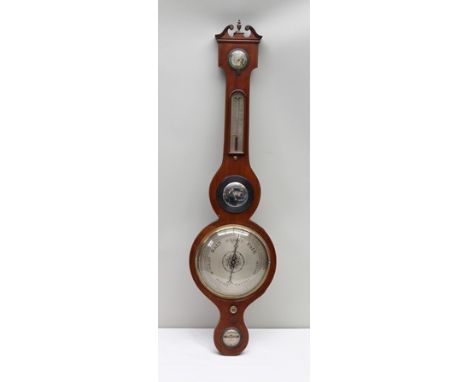 A 19TH CENTURY MAHOGANY BANJO FORM BAROMETER, THERMOMETER AND HYDROMETER with scrolling crest with central urn finial, the ma