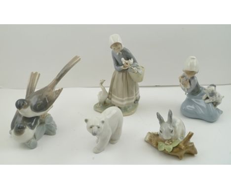 A COLLECTION OF FIVE LLADRO CERAMIC FIGURINES, includes Goose Girl, 22cm high, Rabbit on a bough, Polar Bear etc. (5) 