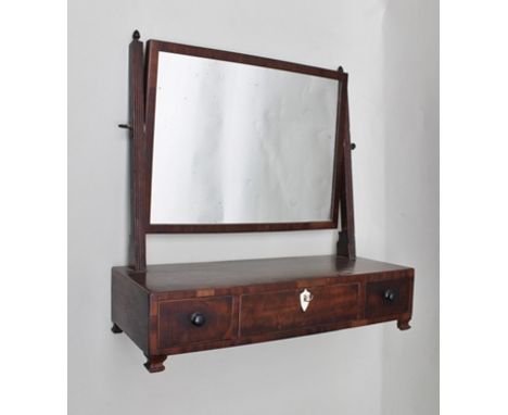 A 19TH CENTURY MAHOGANY BOX BASE DRESSING TABLE MIRROR, supports with acorn finials, base fitted three drawers, on ogee brack