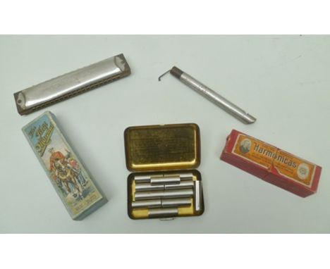 A SET OF PIANO TUNER'S PITCH PIPES, together with a Sun Brand HARMONICA in ovb, The Field Marshall HARMONICA by F.A. Rauner i