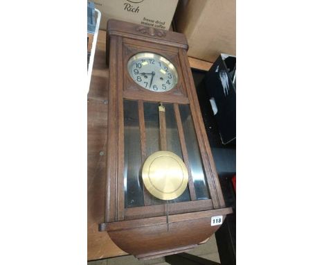 Oak cased wall clock