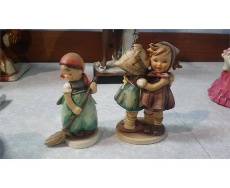 Two Hummel figures
