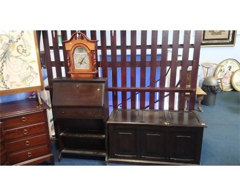 Grandmother clock, a bureau and a blanket box