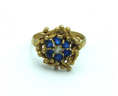 A 9ct gold ring set with blue &amp; white paste stones, 3.4g, size P