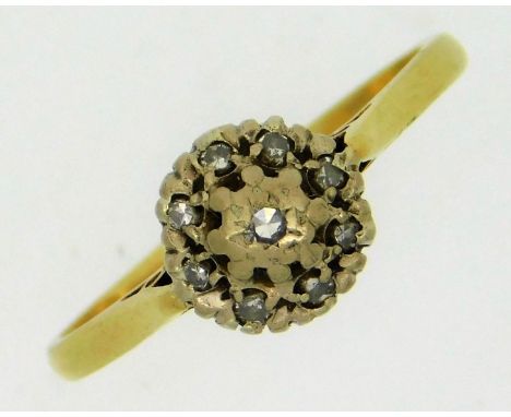 An 18ct gold ring set with small diamonds, wear to mounts, 2.5g, size M 