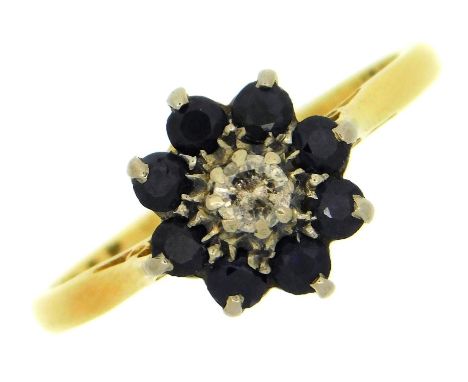 An 18ct gold ring with floral style setting of sapphire &amp; small diamond, 3g, size P/Q 