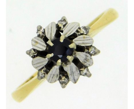 An 18ct gold ring set with small diamonds &amp; sapphire, size O/P, 2.9g