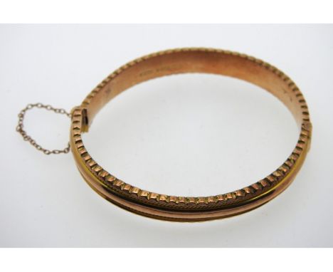 An antique 9ct rose gold bangle, 63mm internal diameter, 10.3g