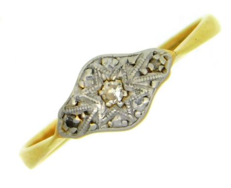 A 1920's 18ct gold ring with three small platinum set diamonds, 1.7g, size N 