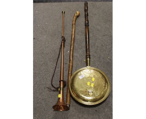 A BRASS AND COPPER HUNTING HORN, WALKING STICK AND A WARMING PAN (3)