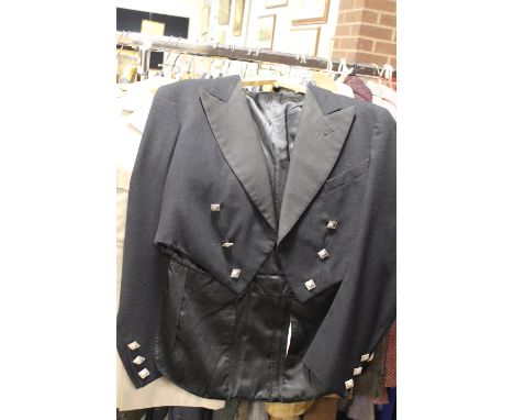 TWO VINTAGE UNIFORM JACKETS COMPRISING A SCOTTISH POLICE JACKET AND INDIAN RAJ BRITISH JACKET