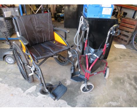 A G EXPLORER WHEELCHAIR AND A DRIVE MOBILITY WALKER