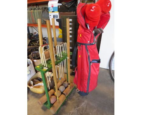 A GARDEN CROQUET SET TOGETHER WTIH VINTAGE GOLF CLUBS