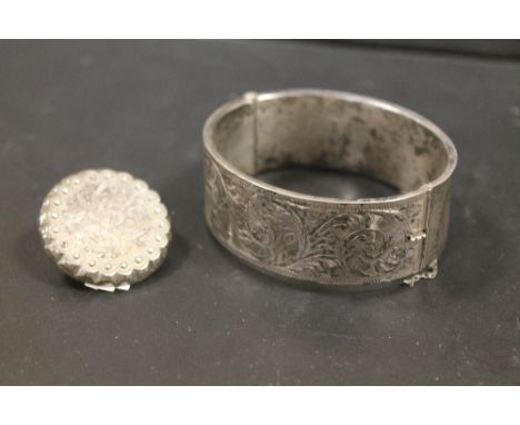 A CHESTER HALLMARKED SILVER CLASP BANGLE TOGETHER WITH A BROOCH