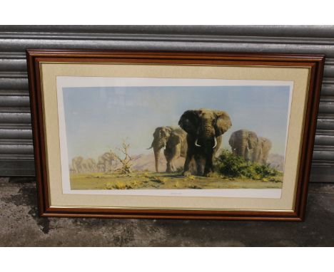 A LARGE FRAMED AN GLAZED DAVID SHEPHERD PRINT OF ELEPHANTS ENTITLED 'THE IVORY IS THEIRS' - NB NEEDS STRAIGHTENING IN FRAMED