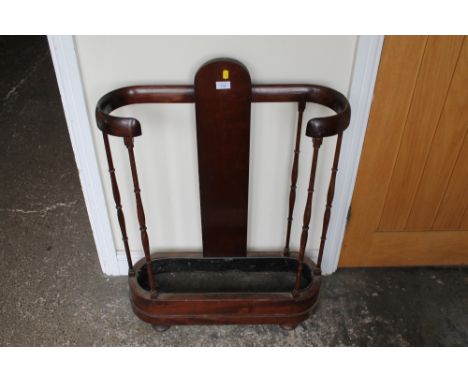 AN ANTIQUE MAHOGANY STICK STAND