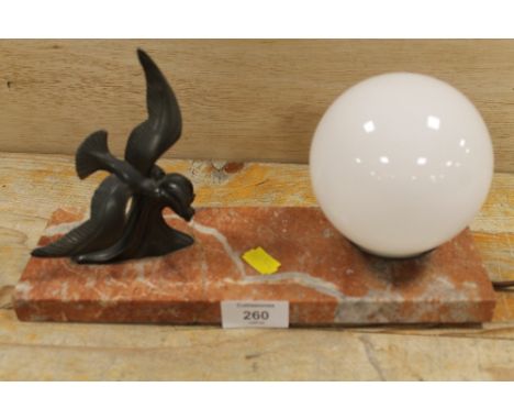 AN ART DECO STYLE TABLE LAMP WITH A SEA BIRD ON THE CREST OF A WAVE