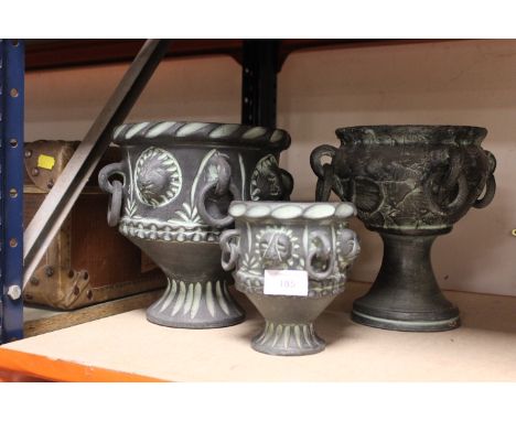 THREE GRADUATED CERAMIC PLANTERS