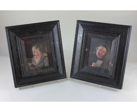 After Carl Kronberger (1841-1921), two colour prints of an old lady reading and a monk smoking a pipe, framed as a pair, with