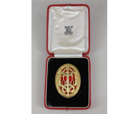 A George VI silver gilt and red enamel Knight Bachelor's badge, maker Royal Mint, London 1948, in original fitted case