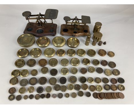 A large collection of Victorian and later brass weights, 1/4oz to 2lbs, makers including J&amp;J Siddons, W&amp;T Avery, H. P