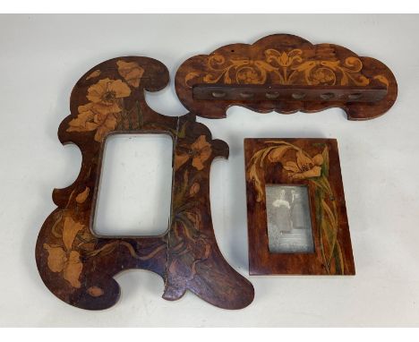 An Art Nouveau painted mahogany photograph frame, of scalloped form, aperture 14cm by 9cm  (a/f- repaired) together with a si