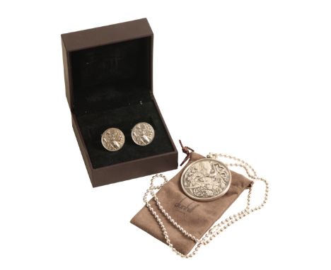 DUNHILL: A GOODWOOD FESTIVAL OF SPEED 2003 DRIVERS CLUB MEDAL numbered "1333", together with matching cufflinks, the medal an