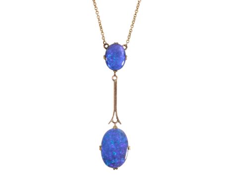 AN OPAL DOUBLET PENDANT NECKLACE formed of two graduated doublet opals with dark blue and green hues, attached to a fine chai