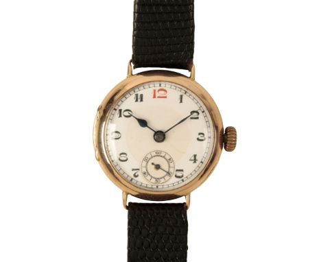 A 9CT GOLD GENTLEMAN'S TRENCH WATCH with manual wind movement, the white enamel dial with subsidiary seconds dial, black Arab