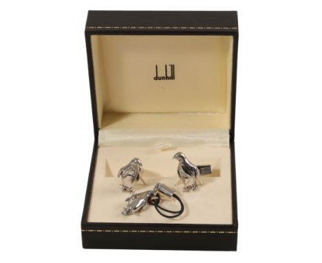 DUNHILL; A PAIR OF GENTLEMAN'S SILVER CUFFLINKS of penguin form, together with a matching penguin charm, in a fitted presenta