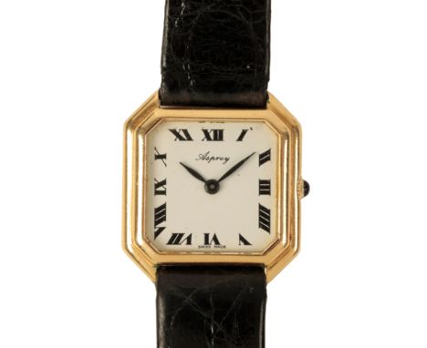 ASPREY: A LADY'S 18CT GOLD  WRISTWATCH with a Baume and Mercier manual wind movement, the white dial with black Roman numeral