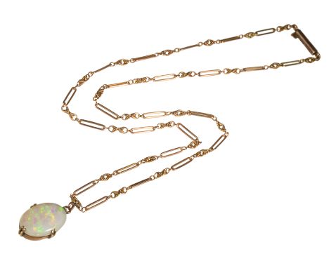 AN OPAL PENDANT NECKLACE the white opal with green and blue hues, attached to an unmarked yellow gold fancy link chain, (c.8.