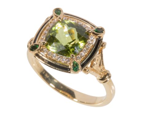 A PERIDOT, GREEN GARNET AND DIAMOND DRESS RING within a black enamel border, on an 18k yellow gold shank, with engraved shape