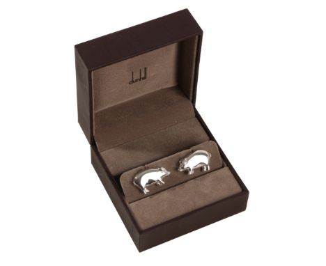DUNHILL: A PAIR OF GENTLEMAN'S SILVER CUFFLINKS of pig form, in a fitted presentation case