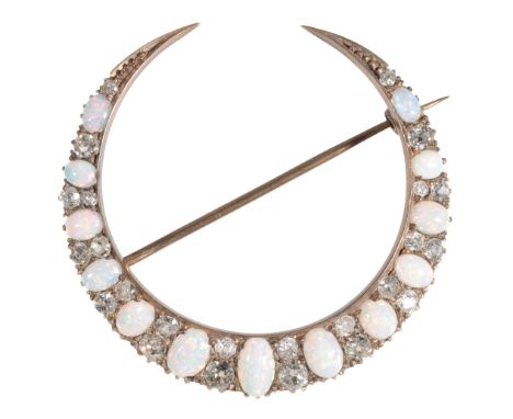 A VICTORIAN OPAL AND DIAMOND CRESCENT BROOCH the thirteen graduated opals with pink, green and blue hues interspersed with ol