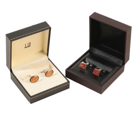 DUNHILL: A PAIR OF GENTLEMAN'S SILVER AND CARNELIAN&nbsp;CUFFLINKS together with one other pair of oval form cufflinks, both 