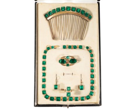 A GREEN PASTE DEMI-PARURE 19th century and later. Comprising necklace, hair comb, brooch, earrings, with later fish hook fast