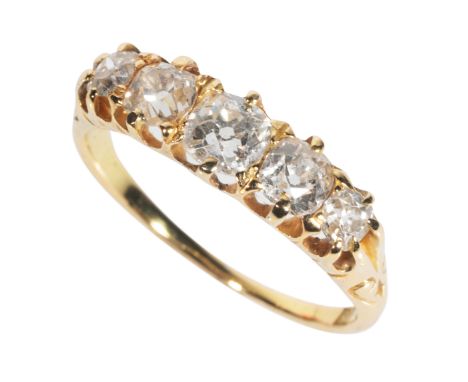 A FIVE STONE DIAMOND RING set with five old-cut diamonds, on a yellow gold shank with engraved shoulders, (c.2.5grams total w