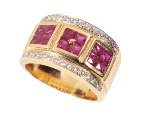 A  SYNTHETIC RUBY AND DIAMOND CLUSTER RING on an unmarked yellow metal  wide band, ring size O