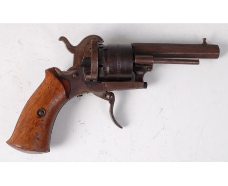A Belgian six-shot pin fire revolver, having a 7cm octagonal barrel, the cylinder with Liege proof marks and further marked T